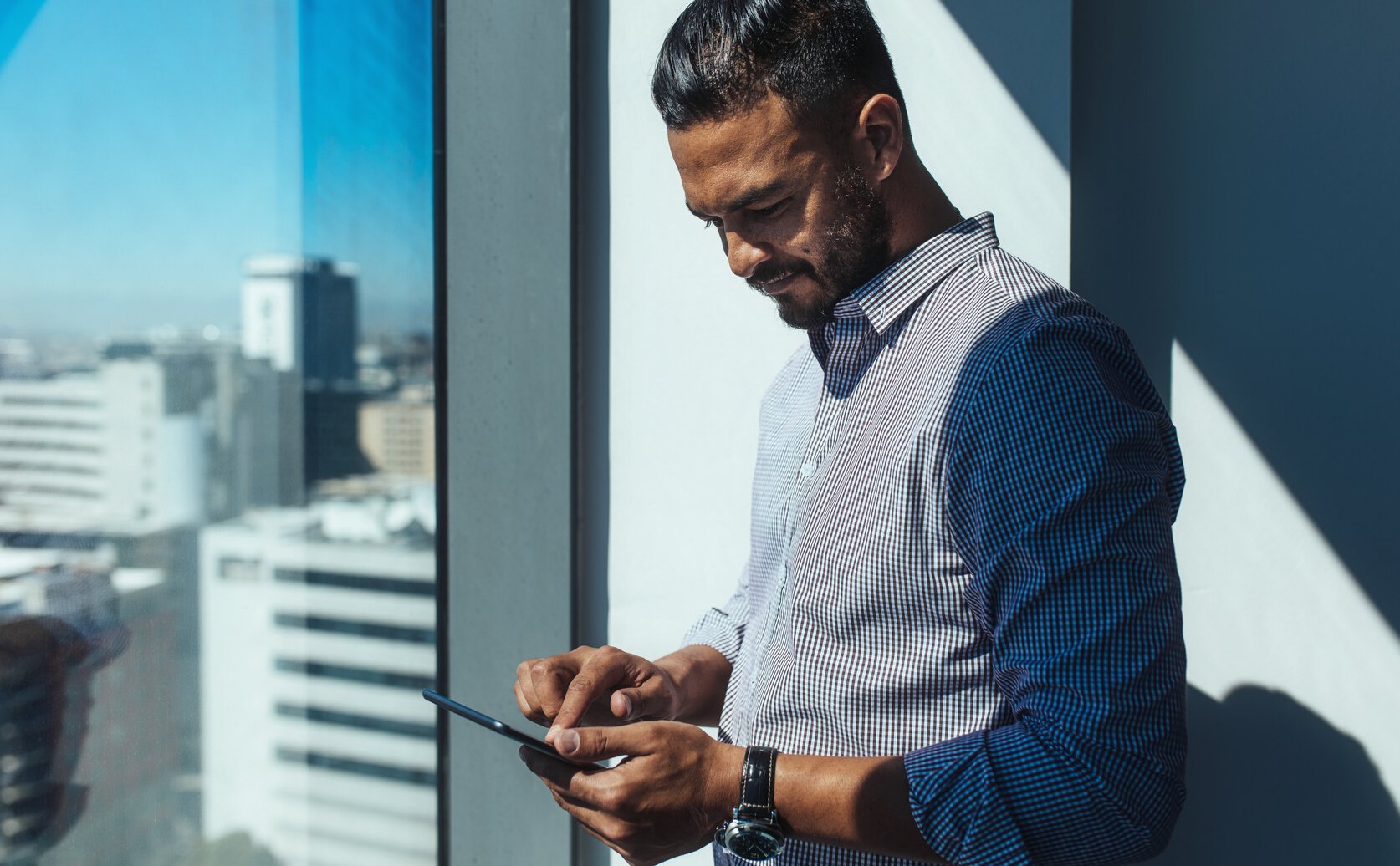 Business Investor Using Phone 